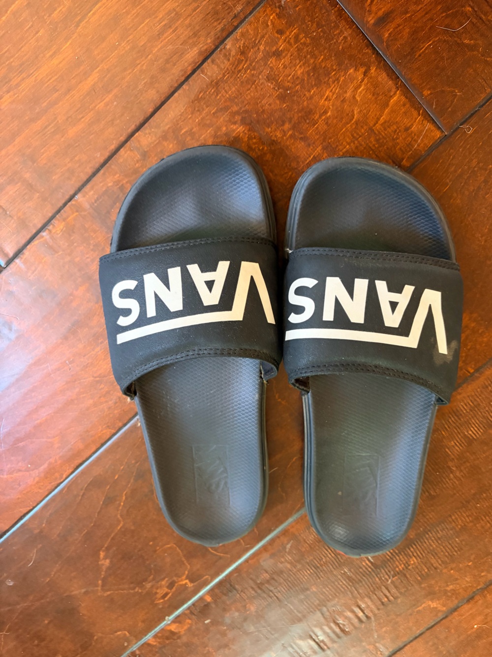 Vans Black Slides with White Logo Strap